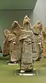 Statuettes protectrices en terre cuite représentant des génies à tête d'oiseau. Assyrie, v. 900-600 av. J.-C. British Museum.