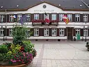 Hôtel de ville actuel, ancienne auberge "A la Rose" (XVIIe-XIXe).