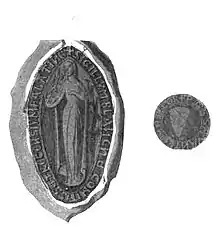 Photo en noir et blanc d'un sceau médiéval représentant une femme debout vêtue d'une riche robe et tenant de la main droite une branche.