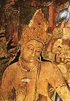 Le Bodhisattva de compassion Padmapani tenant un lotus.