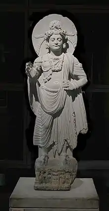 Bodhisattva Avalokiteshvara (ou le prince Siddhârtha Gautama), Shahbaz-Garhi, Ier – IIIe siècle. Schiste, H. 120 cm. Musée Guimet