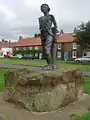 Statue du jeune James Cook.