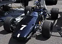 Photo d'une Brabham BT23C noire frappée du numéro 7