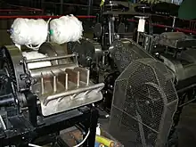 Machine à peigner la laine