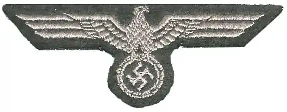 Aigle de poitrine d'un uniforme de troupe blindée.