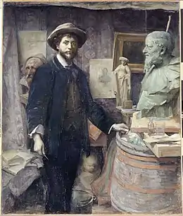 Louise Catherine Breslau, Portrait de Jean Carriès dans son atelier (1886).