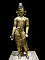 Statue de Bodhisattva Avalokiteshvara, en bronze doré. Népal, XVIe siècle.
