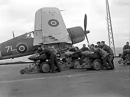 Description de l'image British naval personnel moving bombs before a raid during Operation Goodwood.jpg.
