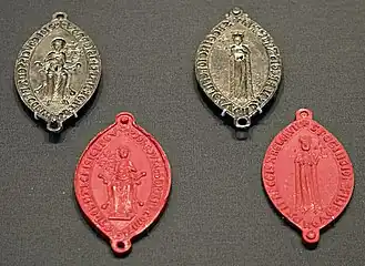 Matrice de sceau double en argent de Jeanne d'Angleterre datant de 1196-99, trouvé à l'abbaye de Grandselve, aujourd'hui conservé au British Museum.