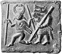 Plaques de Torslunda : Odin suivi par un berserker.