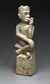 Sculpture en pierre d’un homme et sa pipe (région de Boma)