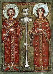 Image religieuse grecque : un homme et une femme, de face, de chaque côté d'une croix grecque