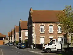 Habitations groupées par deux.