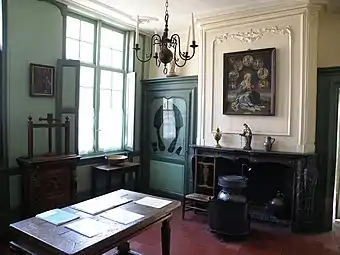 Salle de séjour avec matériel de dentellière etc.