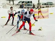 Des athlètes pendant l'épreuve de ski de fond