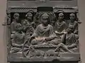 Le premier sermon de Bouddha, à Sarnath. Gandhara, IIe siècle. Schiste gris, H. 28.6 x L. 32,4 cm. Met.