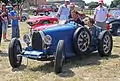 Bugatti Type 35 avec carrossage positif à l'avant.