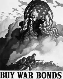 Oncle Sam lance l'appel à des obligations de guerre pour financer l'industrie et l'armement pendant la Seconde Guerre mondiale ; ici le poster d'un War bond de 1942.