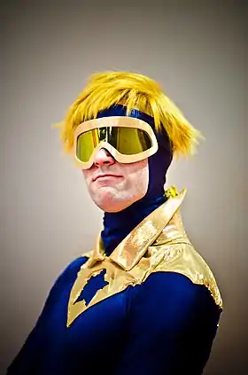 Cosplay de Booster Gold.