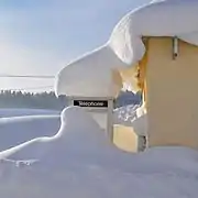 Cabine sous la neige.
