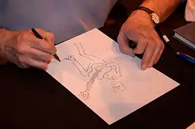 Esquisse dessinée par Cabu du personnage du Grand Duduche lors d'une séance d'autographes au Salon du livre de Paris 2008.