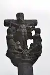 Détail des sculptures de la croix