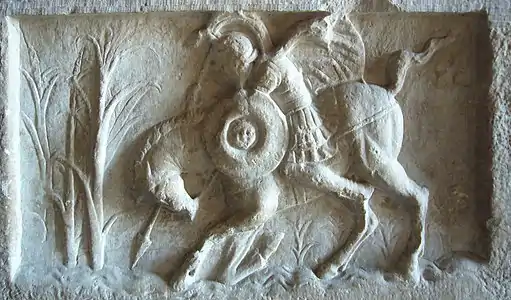Gravure d'un cavalier, avec bouclier, casque et lance.