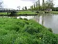 Jonction avec le canal de Pont-l'Abbé-d'Arnoult (sur la gauche)