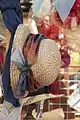 Chapeau de paille à la vente sur un marché florentin.