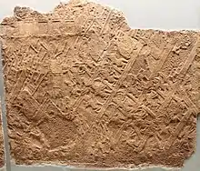 L'assaut des murailles de Lakish par les troupes assyriennes. Bas-relief du palais sud-ouest de Ninive. British Museum.