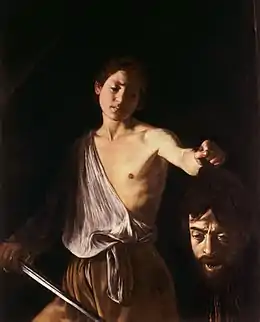 Peinture d'un jeune homme, l'épée à la main, tenant de l'autre main la tête d'un homme barbu décapité.