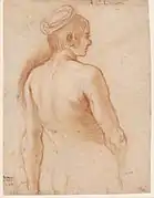 Femme nue assise de dos