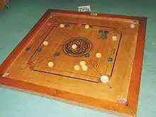 Description de l'image Carrom.jpg.