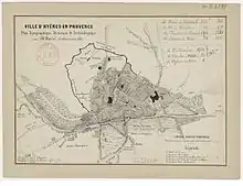 Ancienne carte topographique d'une ville avec cachet administratif rouge et mentions à la plume.