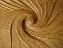 Spirale couleur bois.