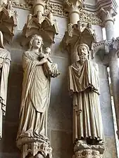 Portail de la Mère-Dieu : la présentation de Jésus au Temple par Marie. À droite Syméon.