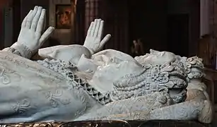 Gisants de Henri II et Catherine de Médicis, rehaussés par le « drapé mouillé »