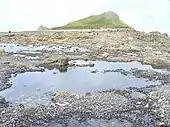 Photographie d'une île à marée basse.