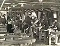 Atelier des menuisiers dans un préfabriqué US.