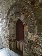 Photographie de la porte dans le passage.