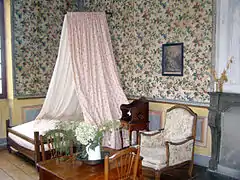 Photo en couleur de la chambre de Madame de Warens dans la maison des Charmettes à Chambéry.