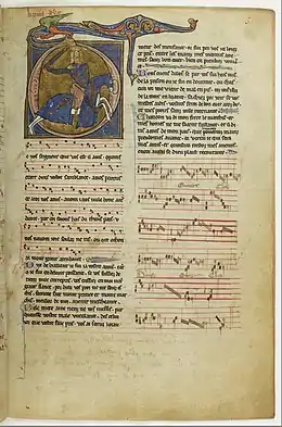Manuscrit avec lettre O illustrée d'un cavalier armé, texte en 2 colonnes, portée à 4 lignes à gauche et 5 à droite