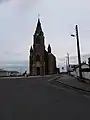 La chapelle vue depuis la route en mars 2022.