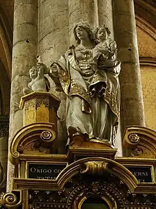 La Vierge retirant un enfant tombé dans un puits (chapelle du pilier rouge, cathédrale d'Amiens)