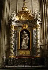 Le retable baroque surmontant l'autel de la chapelle saint Joseph. Au centre, la statue du saint est due à Aimé et Louis Duthoit.