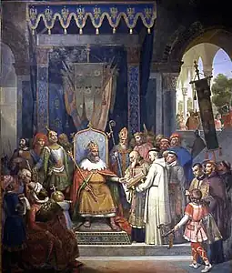 Charlemagne, entouré de ses principaux officiers, reçoit Alcuin qui lui présente des manuscrits, ouvrages de ses moines par Victor Schnetz (XIXe siècle).