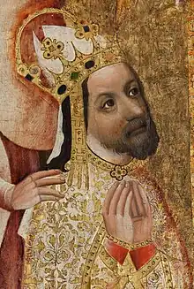 Portrait d'un homme couronné, barbu, en prière ; les tons sont or.