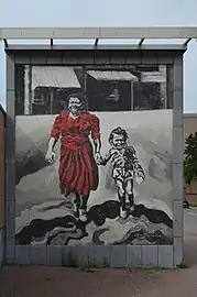 Femme et enfant dans la ville, par Charles Szymkowicz.