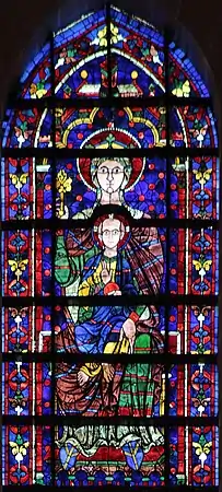 Sommet du vitrail central : Vierge à l'Enfant.