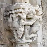 sculpture sur le chapiteau d'une colonne porte ouest.